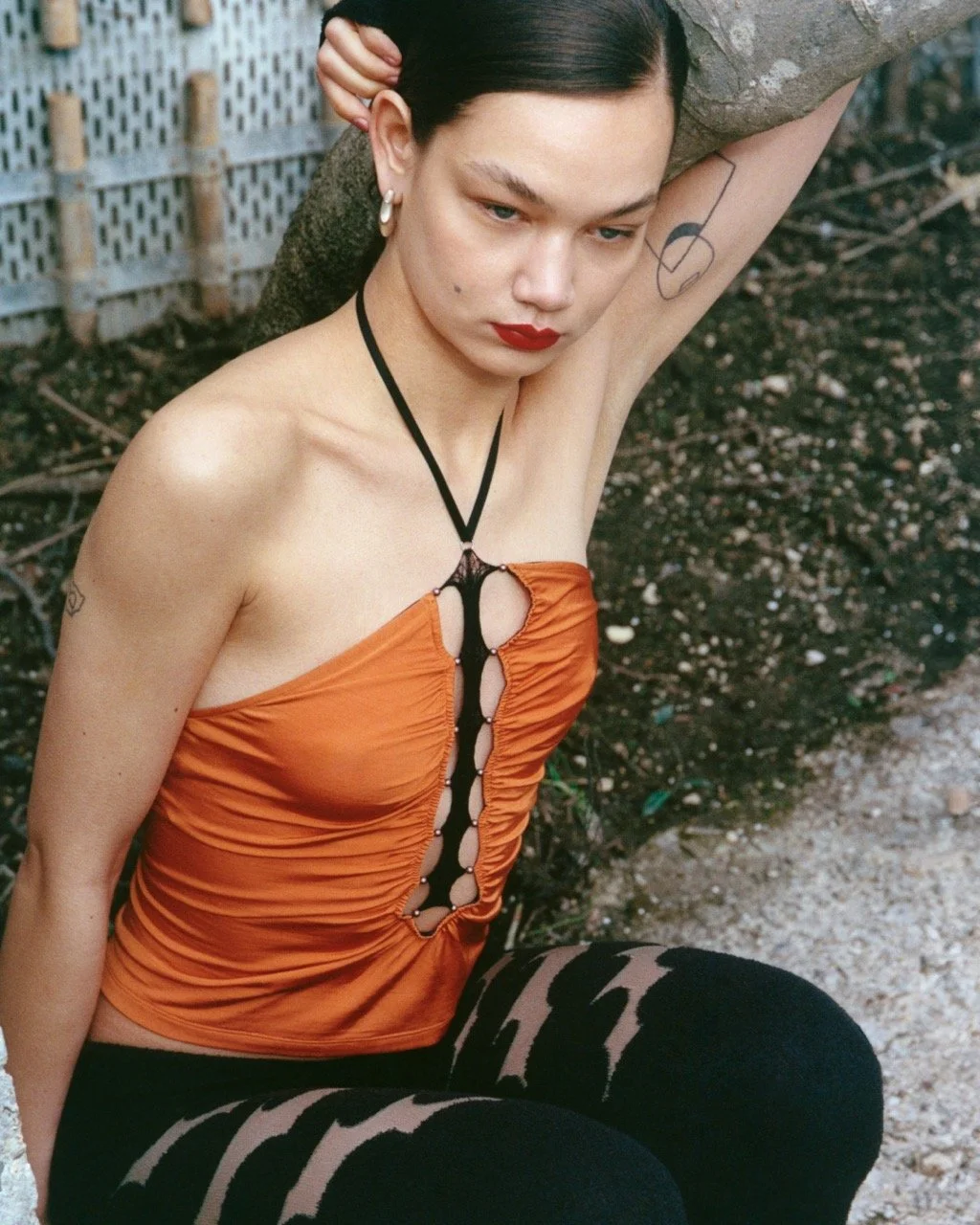 Clothing as door to external world; sharp angles and skin fissures